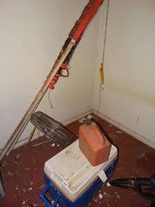 lot 38112 image: Cooler, Plastic Gas Can, Fan and Large Fishing Net
