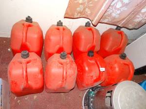 lot 38116 image: Lot of 8 Plastic Gas Cans and Water Dispenser