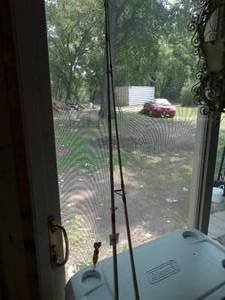 lot 38289 image: Lot of 2 Fishing Poles with Reels