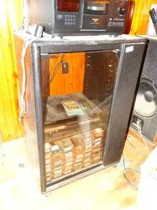 lot 38199 image: Black Media Cabinet with Glass Door