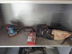lot 1039 image: Skil Belt Sander and Makita Palm Sander