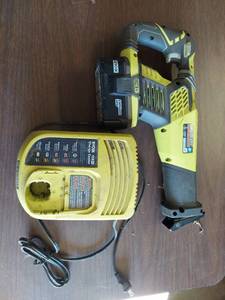 lot 1165 image: Ryobi reciprocating saw - battery does not take a charge