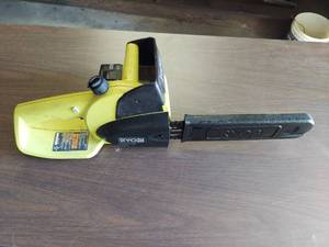 lot 1168 image: Ryobi Chainsaw - battery does not take a charge