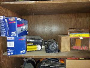 lot 1180 image: automotive filters and lights on shelf
