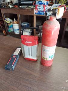 lot 1122 image: flashlights and fire extinguisher