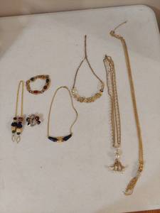 lot 1343 image: 4 necklaces, bracelet and pendant butterfly watch