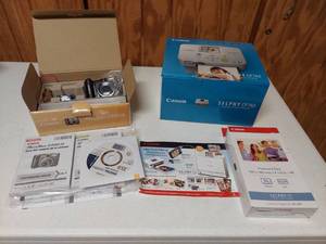 lot 1446 image: Canon Powershot camera, printer and accessories