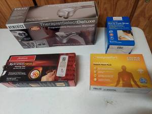 lot 1447 image: Massager, heating pad, hotcold packs