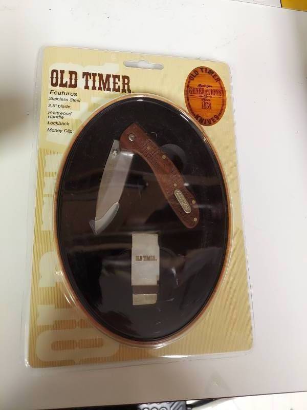 lot 7038 image: Old Timer Knife and Money Clip in Tin