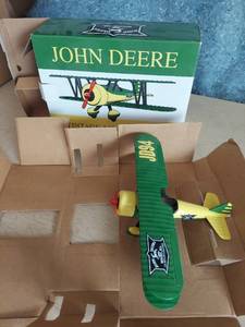 lot 1092 image: John Deere airplane bank