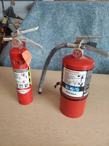 lot 1101 image: 2 fire Extinguishers
