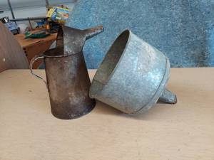 lot 2565 image: galvanized Oil Can and funnel