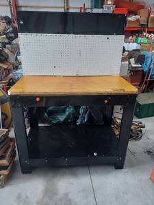 lot 2680 image: Workbench with Pegboard Back