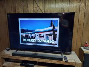 lot 1000 image: TCL TV with Samsung Sound Bar and Sony DVD Player