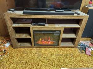 lot 1002 image: TV Stand with Electric Fireplace Heater