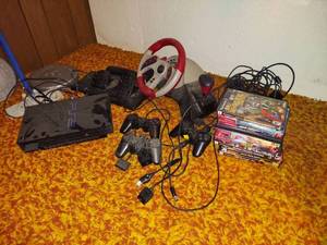 lot 1016 image: Playstation 2 with Games