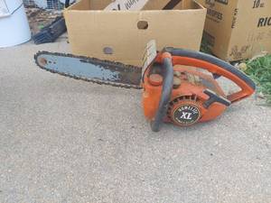 lot 1055 image: Homelite XL Chainsaw