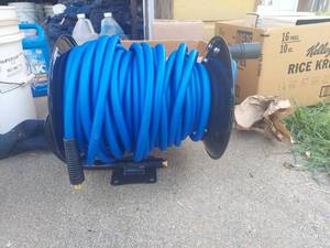 lot 1057 image: Hose Reel with Air Hose
