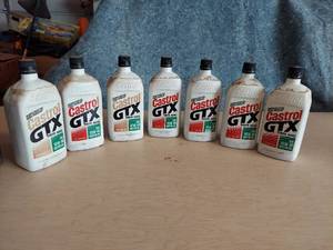 lot 1142 image: 7 Quarts Castrol GTX 10W-40 OIL