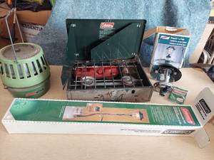 lot 1143 image: Coleman catalytic heater, stove, lantern and tree