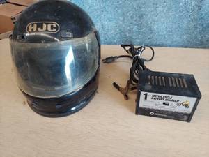 lot 1175 image: motorcycle charger and helmet