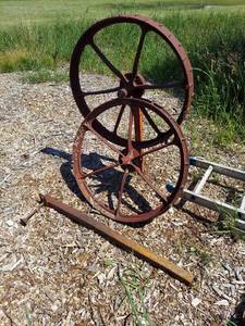 lot 2696 image: Pair of Steel Wheels with Ground Mount Posts