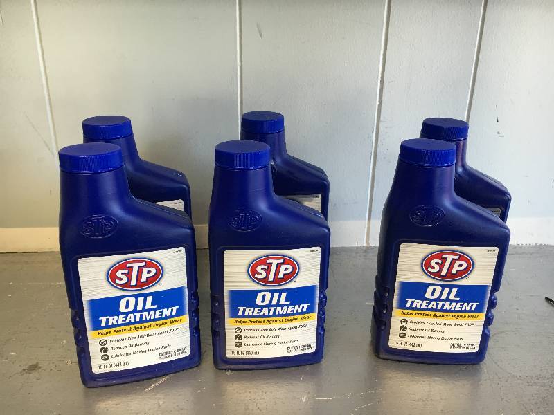 lot 143 image: LOT OF 6 STP OIL TREATMENT