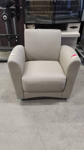 lot 1142 image: Grey Faux Leather Lobby Chair