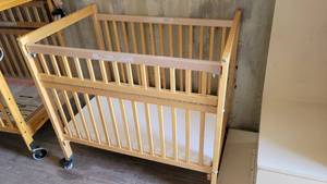 lot 1223 image: Folding Edge Wooden Crib with Mattress
