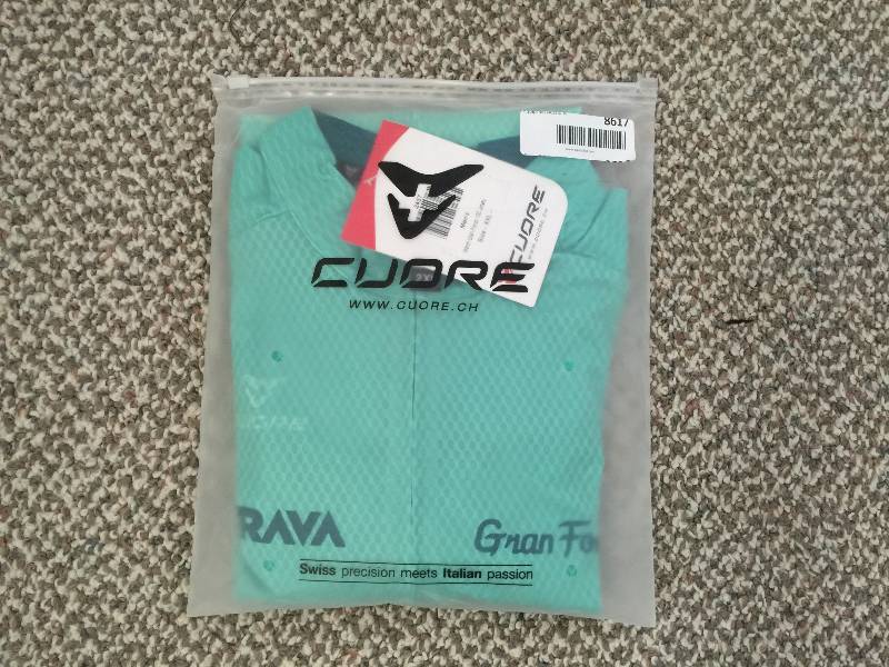lot 8617 image: Limited edition MARCH Gran Fondo 100 Jersey ($109 retail) made by CUORE .