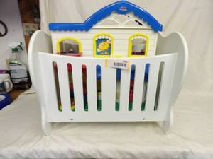 lot 1591 image: Baby Doll Bed & Fisher Price