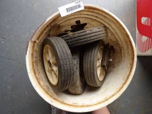 lot 1661 image: Bucket of Mower Wheels