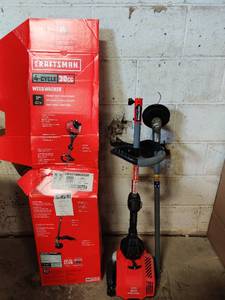 lot 55168 image: Craftsman 4-cycle 30cc weed Wacker (has compression)