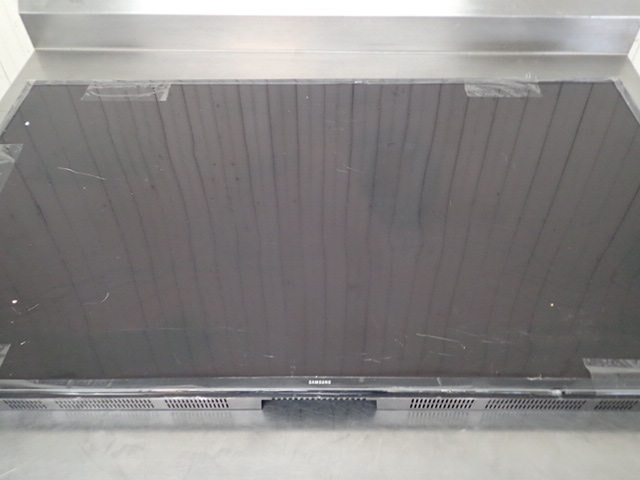 lot 8217 image: Samsung 4K Flat Screen 60in LED TV (BROKEN SCREEN)