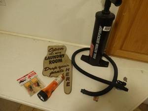lot 1301 image: Air pump flashlight laundry sign