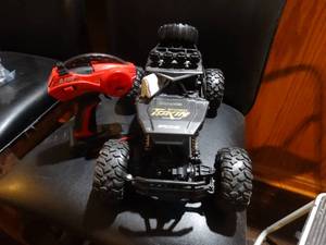 lot 1306 image: Maxis rodeo Tokin remote control car