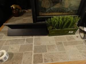 lot 1334 image: Wall shelf & fuax grass decor