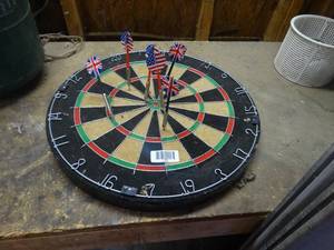 lot 1366 image: Dart board w darts