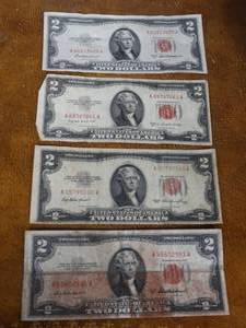 lot 1016 image: 4- red seal 2 dollar bills