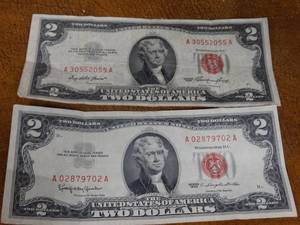 lot 1017 image: 2- red seal 2 dollar bills