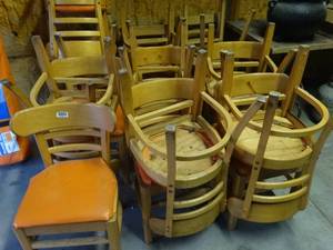 lot 1512 image: 18 wood framed dining chairs from Hooters