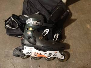 lot 1559 image: Pair of Ultra roller blades & bag