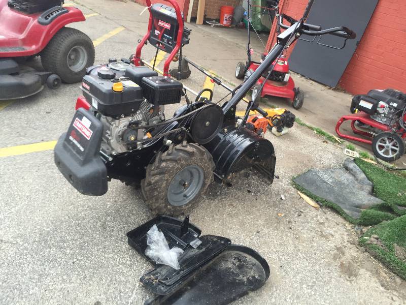 lot 8296 image: Craftsman 208CC Dual Rotating Rear Tine Tiller