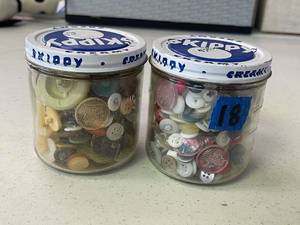 lot 18 image: vtg skippy jars, full of misc buttons. (2)