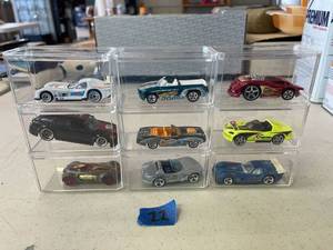 lot 22 image: Hotwheel cars, with clear cases. QTY 9