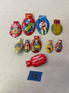 lot 25 image: Vintage noise makers, clickers- hoffners coffee, calverts, cowboys and more. QTY 10