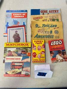 lot 32 image: Vintage paper books booklets. matchbook, lego, comic strips, kadets of america, school crayons.