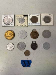 lot 33 image: Vintage tokens, and coin. QTY 13