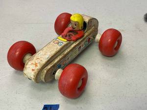 lot 36 image: Vintage Fisher price bouncy racer, works.