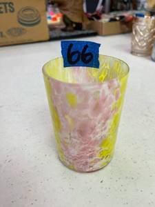 lot 66 image: Glass tumbler, pink and yellow.